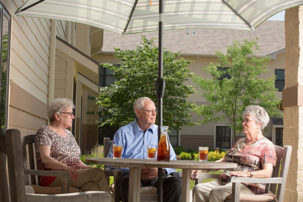 Residents Enjoying Ice Tea Outsid