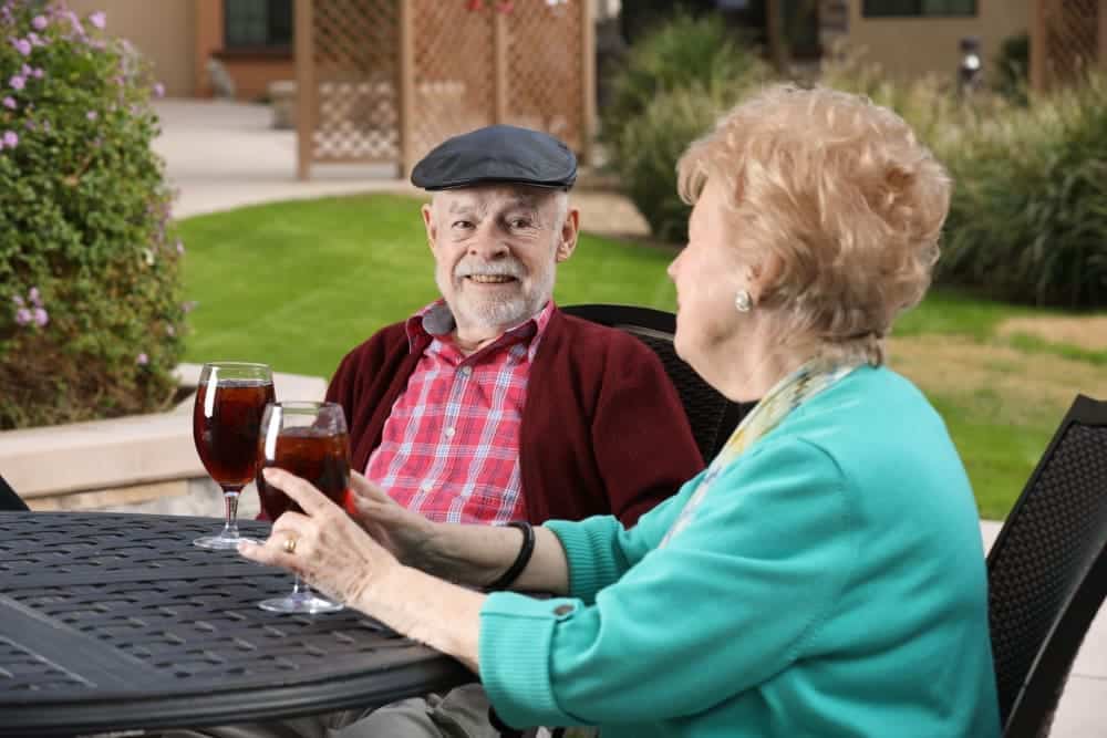 Residents Enjoying Drink Outside
