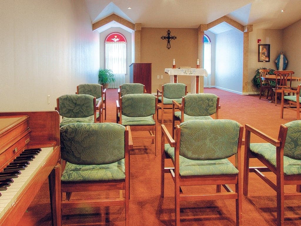 College View Chapel With Chairs And Piano