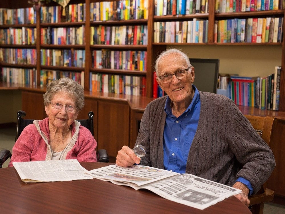 Residents Reading The Newspaper