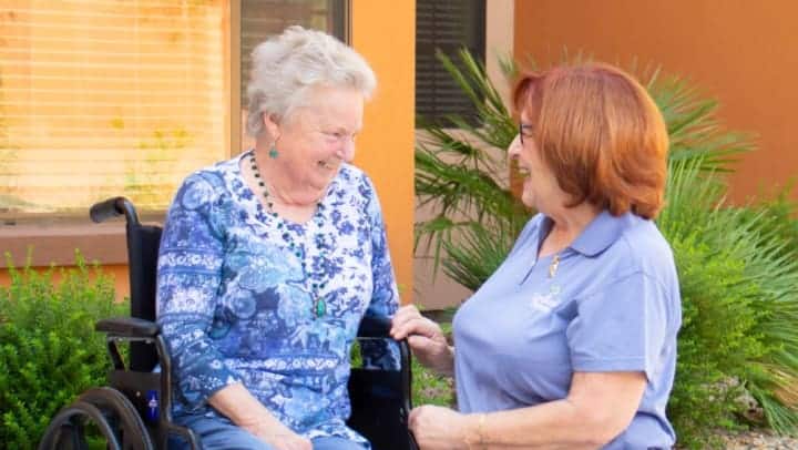 K-Support__7__Jnzx8S Senior Woman With Caregiver Outdoors