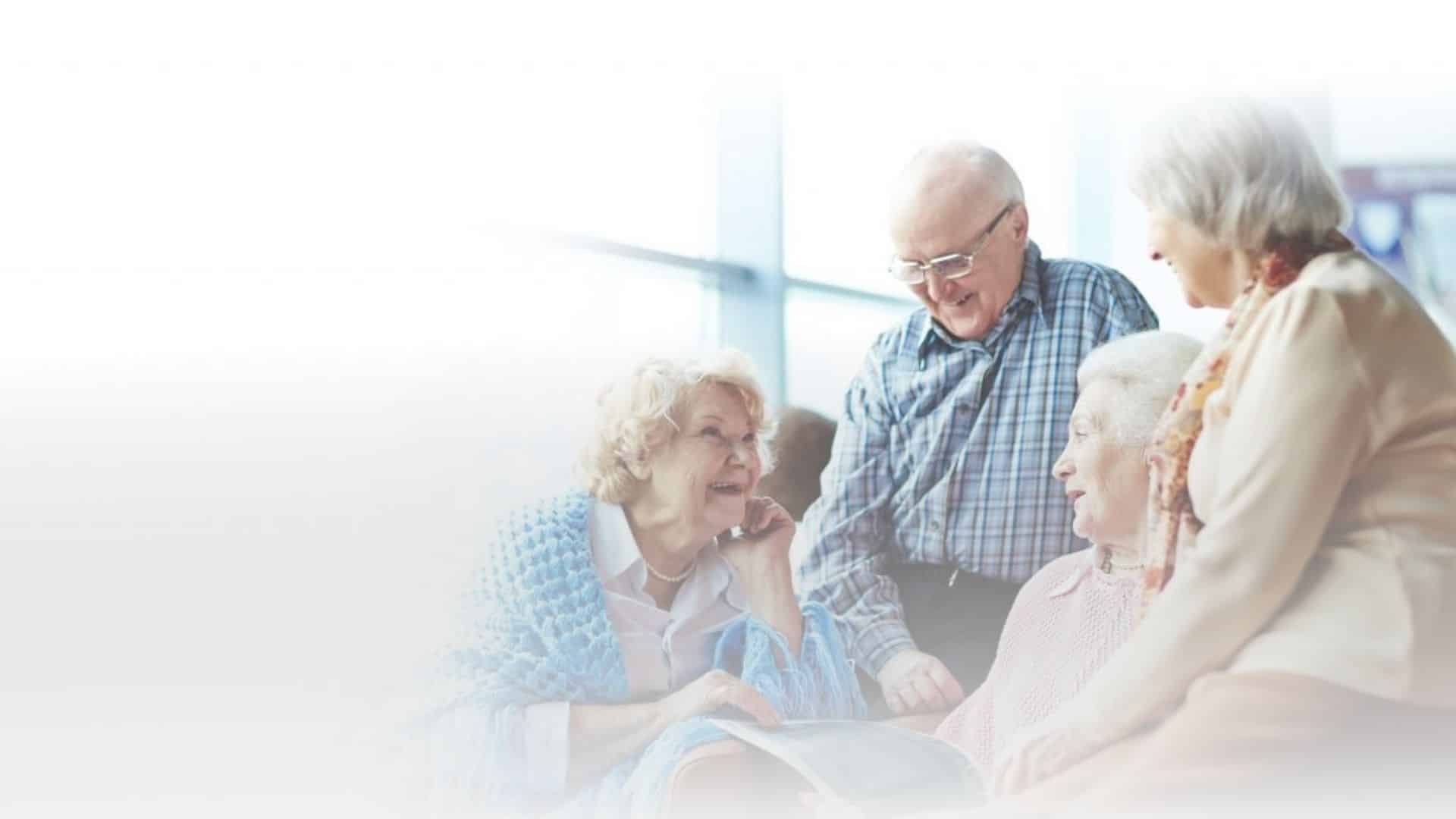 Senior Woman With Caregiver Outdoors