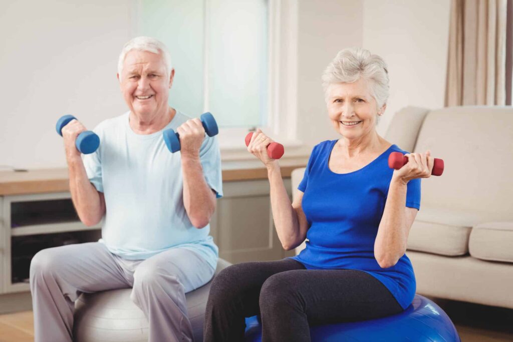 Seniors working out in the fitness center enjoying senior living communities today