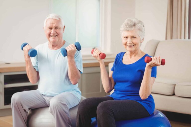 Seniors working out in the fitness center enjoying senior living communities today