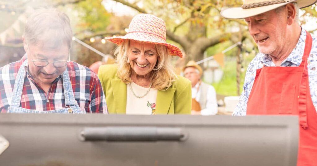 Settling into your new senior living home Group of people grilling