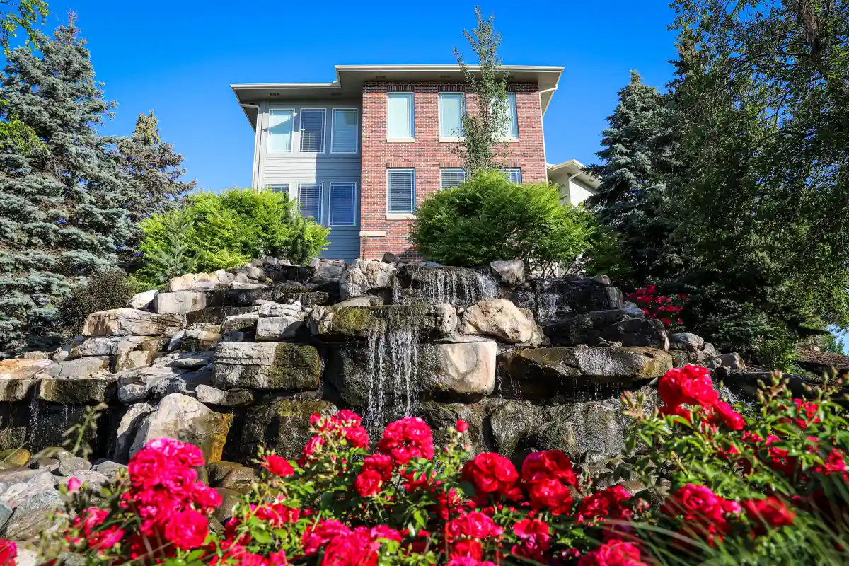Landscaping with a rock waterfall at Heritage Pointe