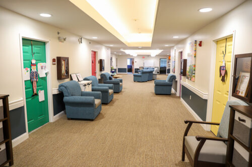Fountain View Senior Living memory care hallway with chairs