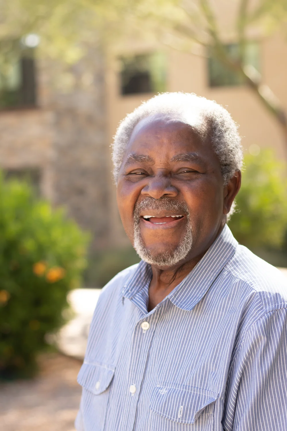 A senior male smiling from Orchard Pointe at Surprise retirement community